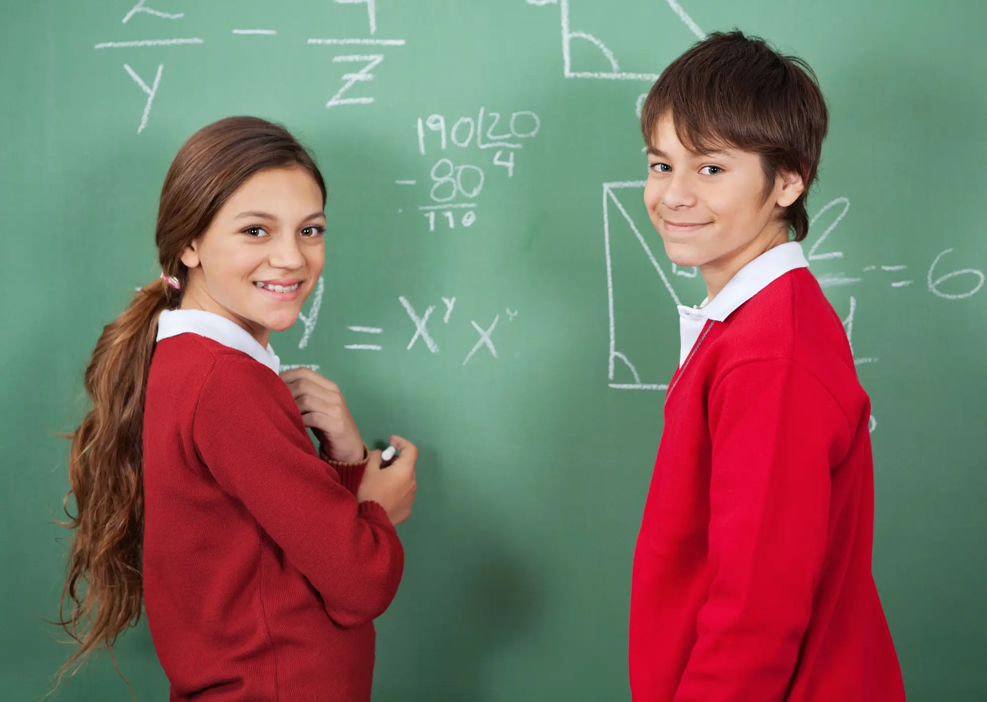 Image of a girl and boy in school uniform